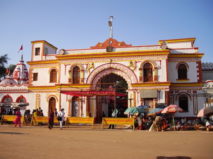 The white and orange gate of Bastar palace and the white and red dome of Danteswari temple Jagdalpur