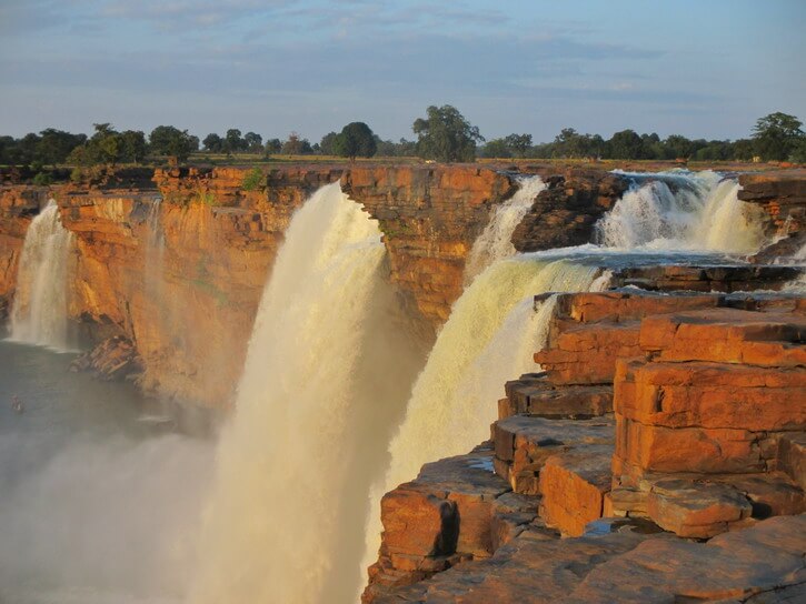 Chitrakoot Chhattisgarh falls with a beautiful orange color because of the sunset