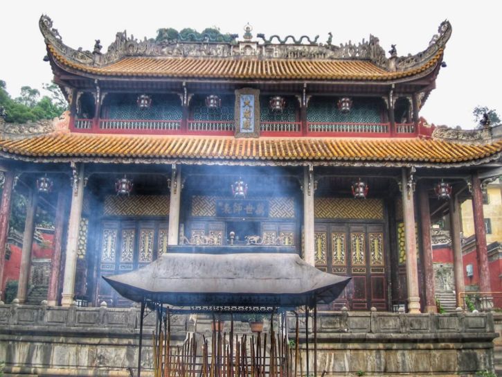 A building of the temple with incense sticks