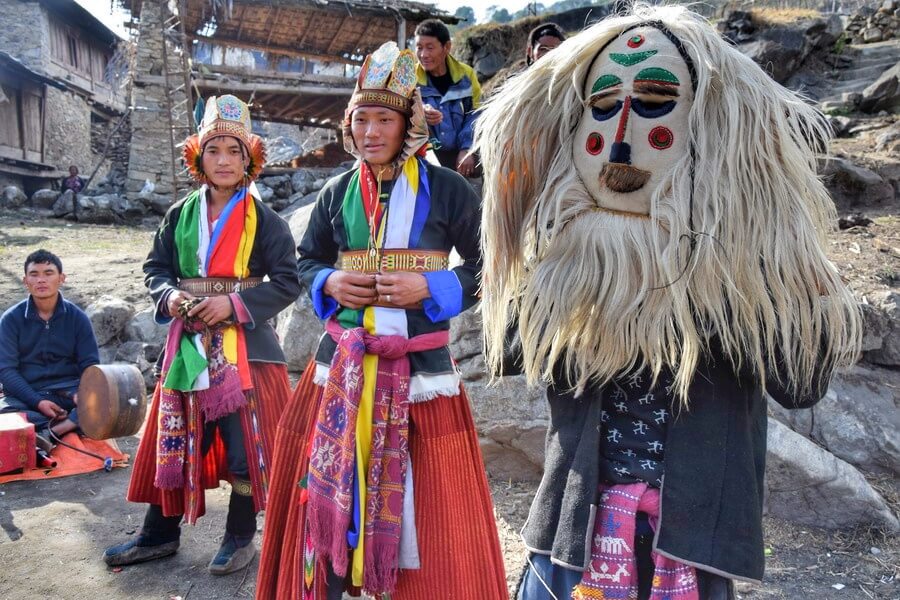 Monpas dancers in traditional Cham dance attire
